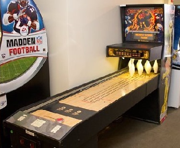 http://www.coinoppartsetc.com/sites/default/files/products/STRIKE%20MASTER%20Puck%20Bowler%20Shuffle%20Alley%20Arcade%20Machine%20Game%20for%20sale%20by%20WILLIAMS.jpg